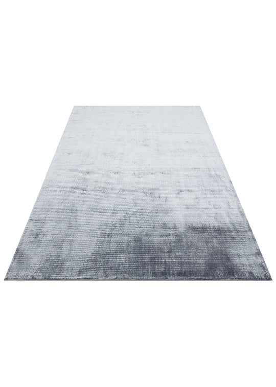 Pier Blue, El Dokuma Teknikleri ile %100 Naturel Viskondan üretilen Sade Tek Renk Salon Halısı