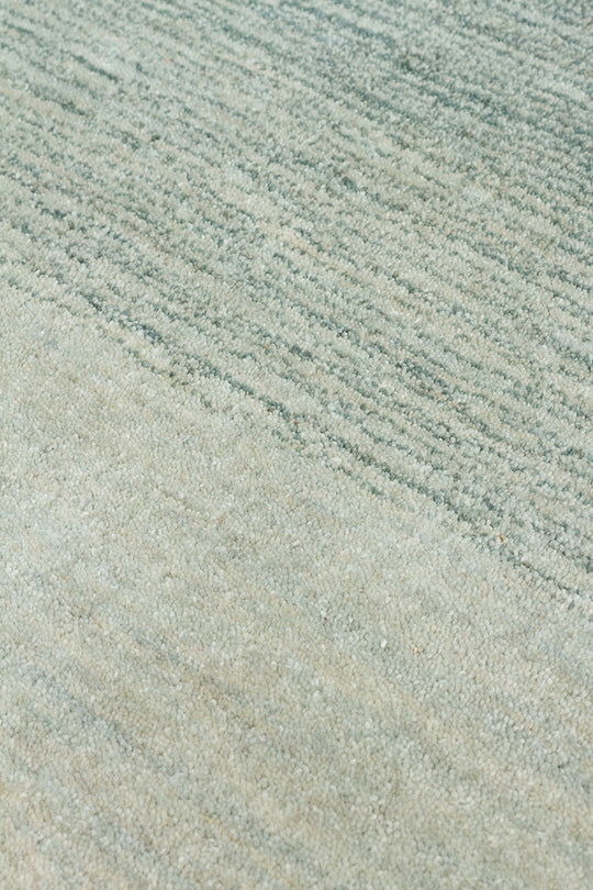 Odesa Pearl Blue, Modern Çizgilere Sahip Renk Geçişli %100 Saf Yün ile Üretilen Salon Halısı